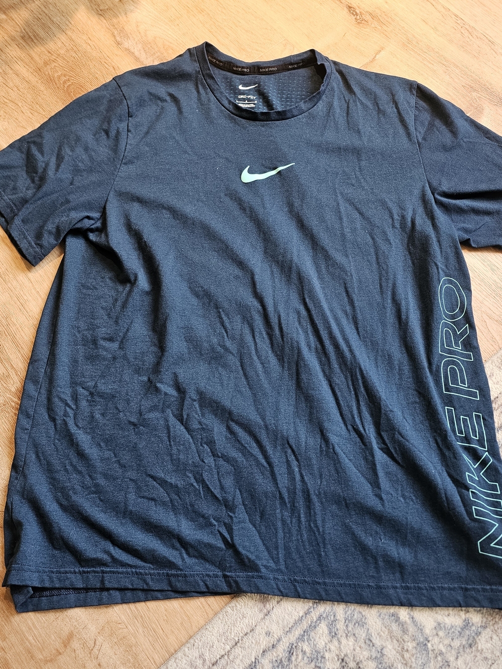 Nike Black Short Sleeve Tee with Teal Swoosh